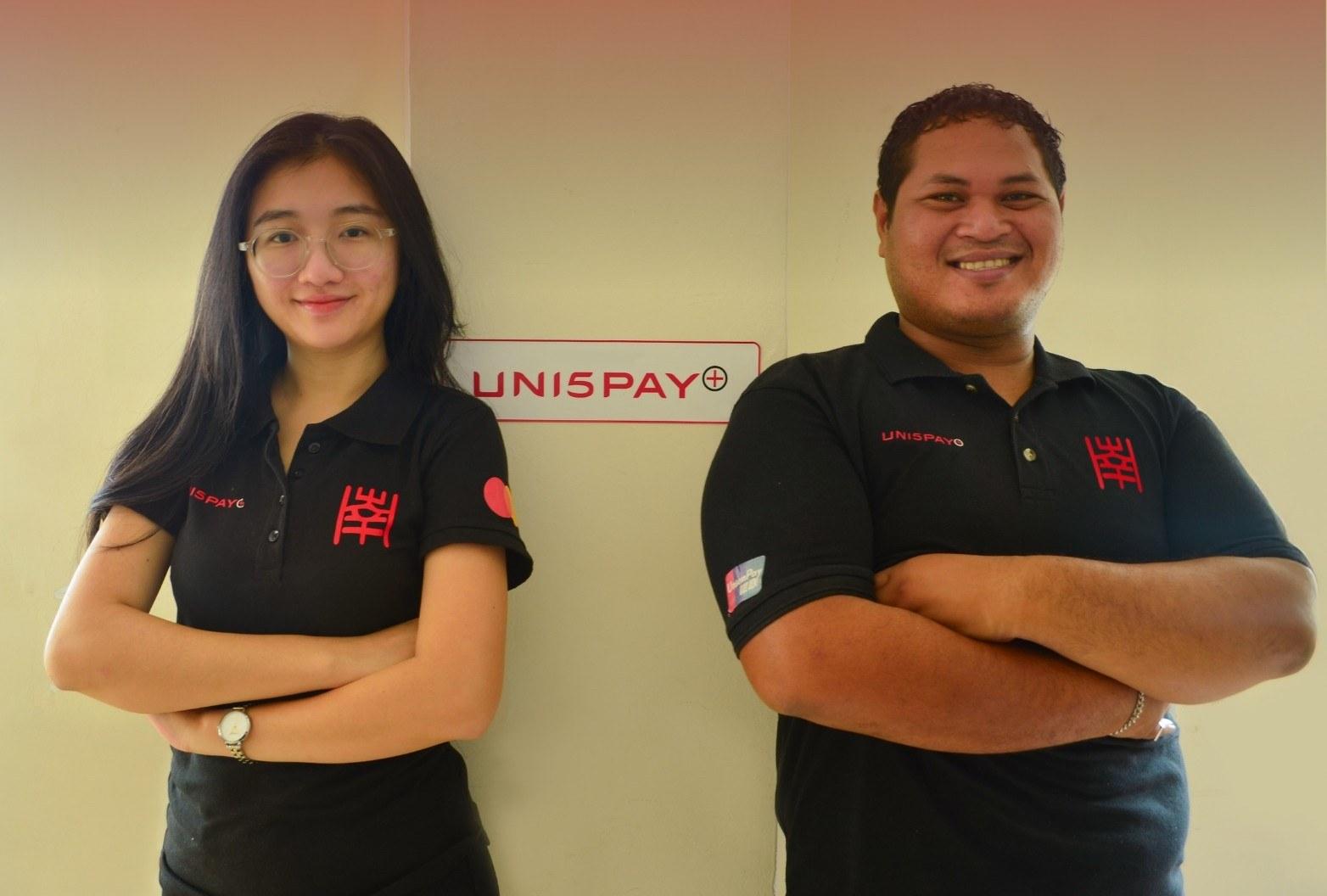 Two Uni5Pay team members